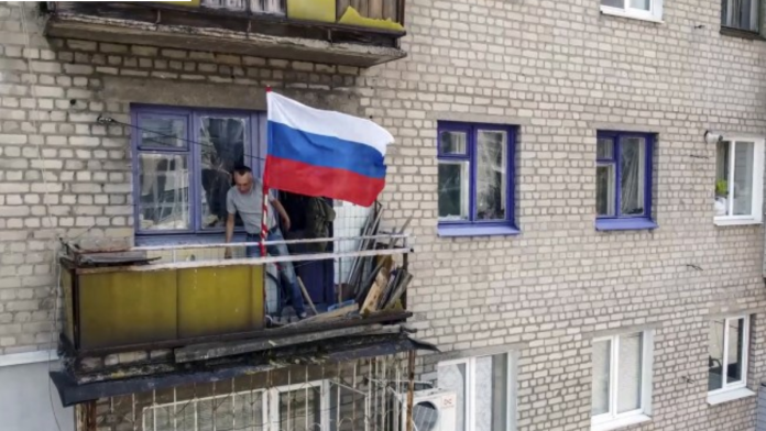 русия