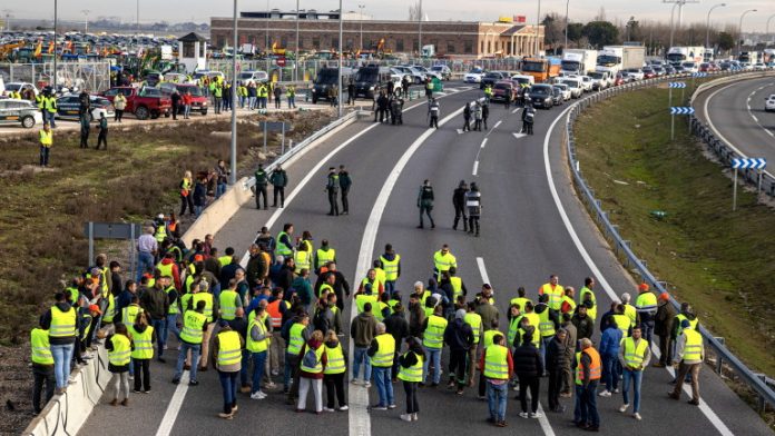 Spanish farmers march towards downtown Madrid