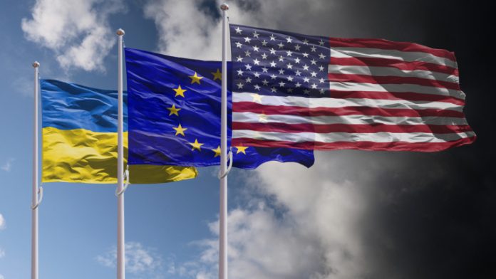 Ukraine, EU and USA flags above dark sky